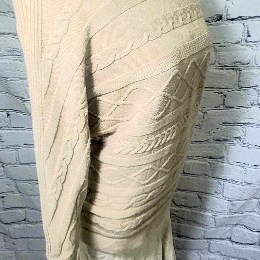 Blattering tan sweater.....🤎